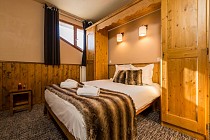 Chalet Val 2400 Val Thorens - slaapkamer met 2-persoonsbed en dakraam